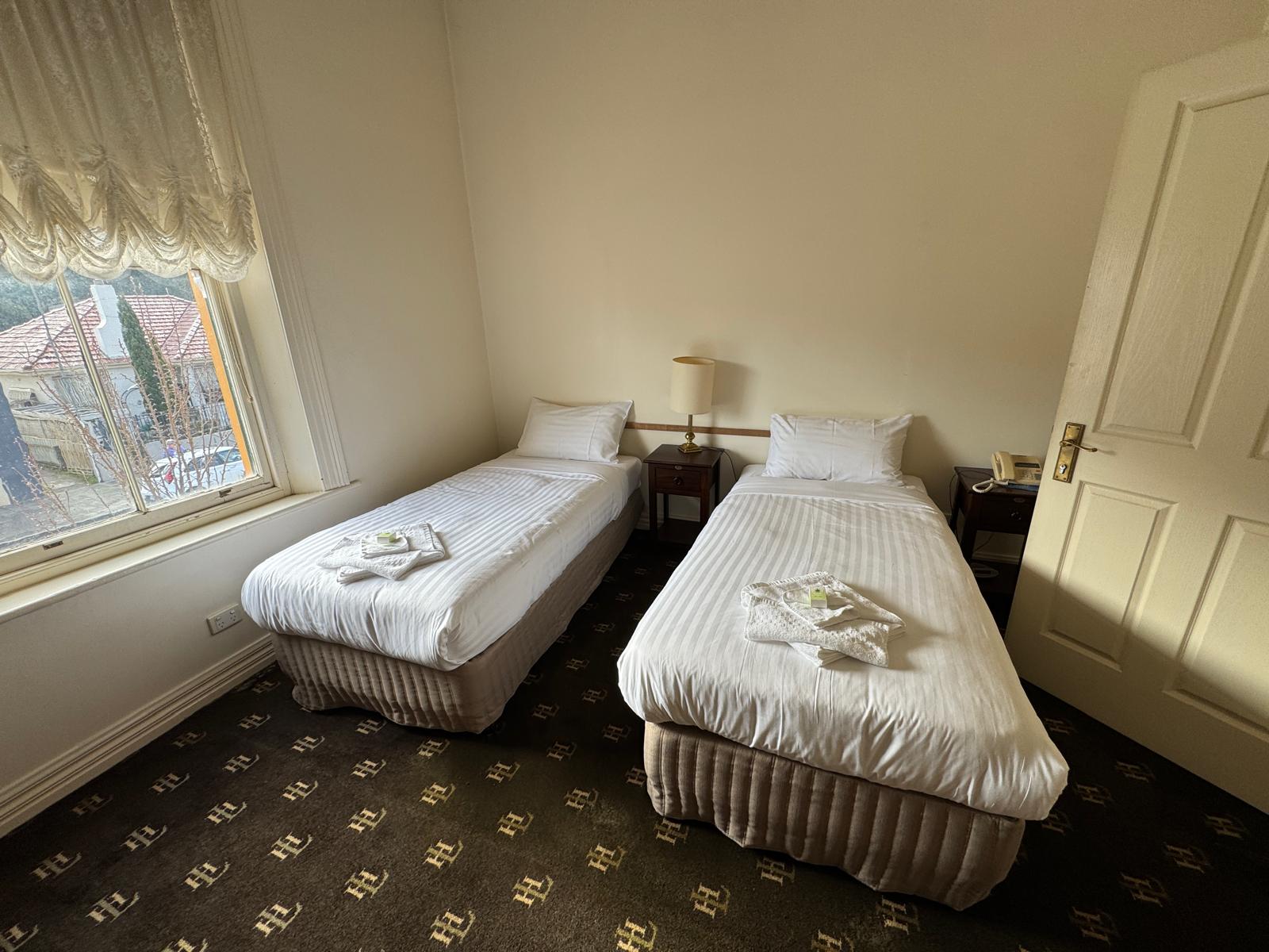 Twin room with two single beds at Lucas Hotel, Latrobe Tasmania.